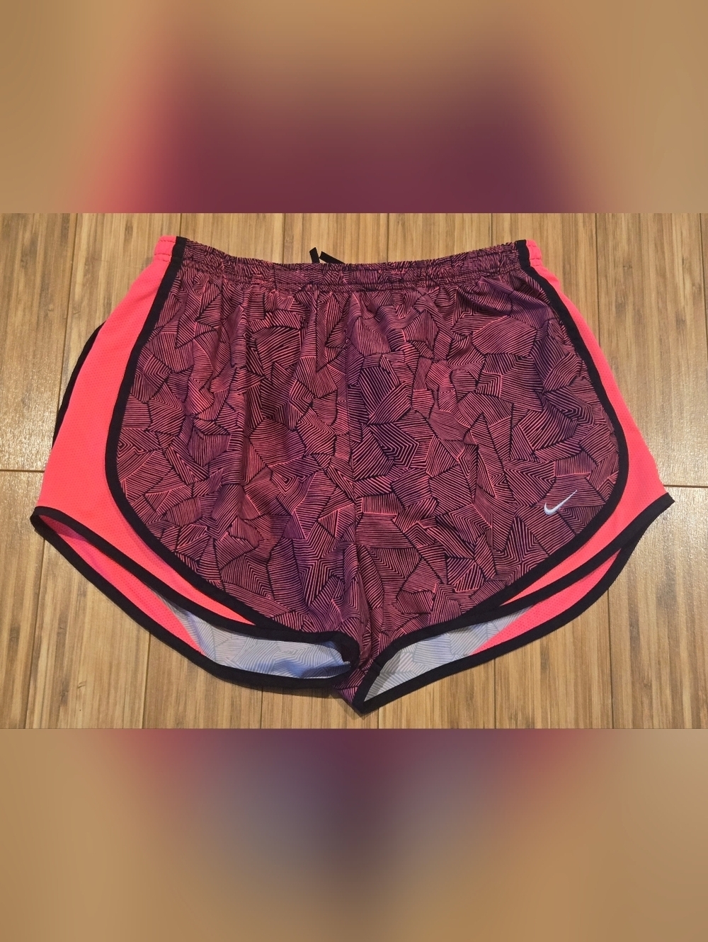 Nike Women’s Pink Coral Patterned Athletic Shorts